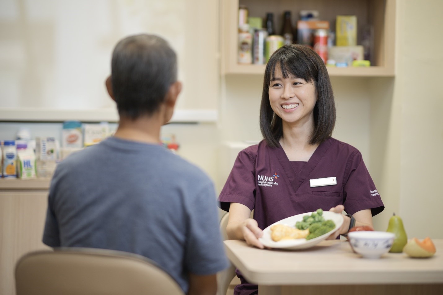 Dietician smiling at a patient