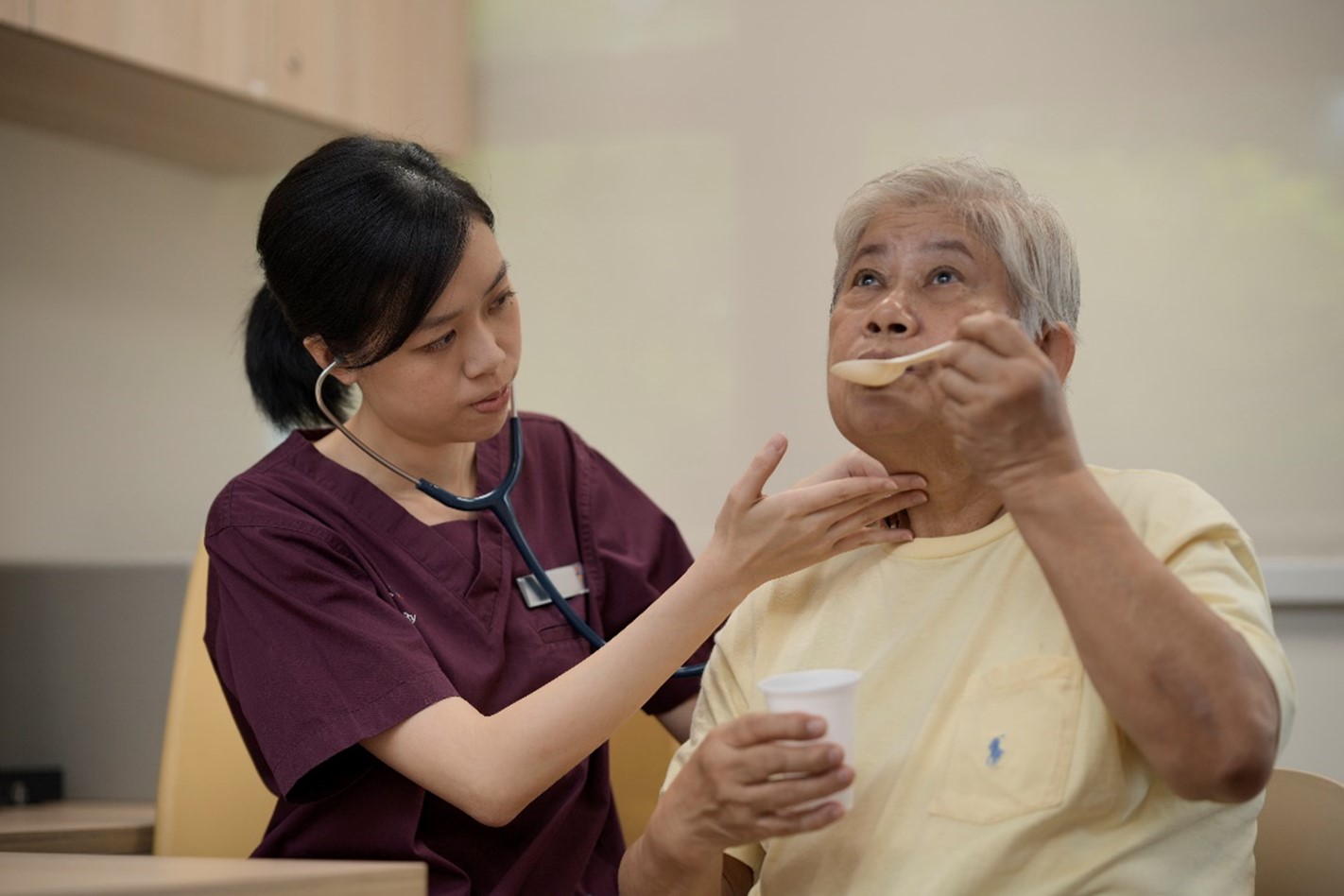 Nurse providing Speech Therapy